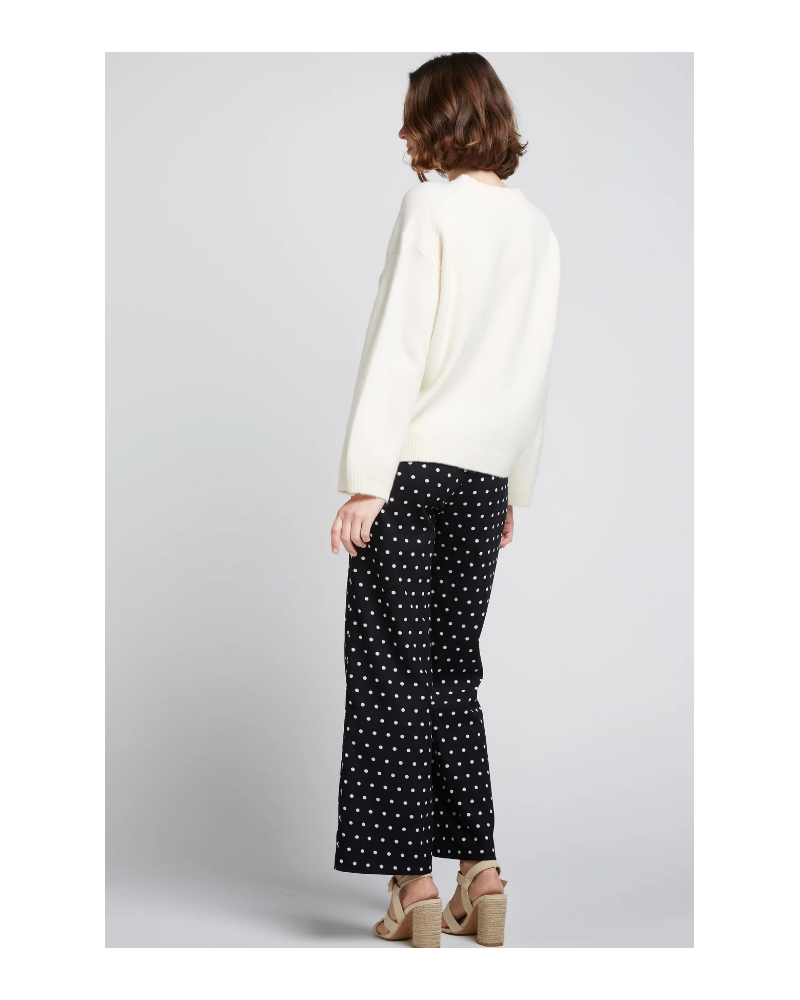 PANTALON NEGRO CON LUNARES BLANCOS