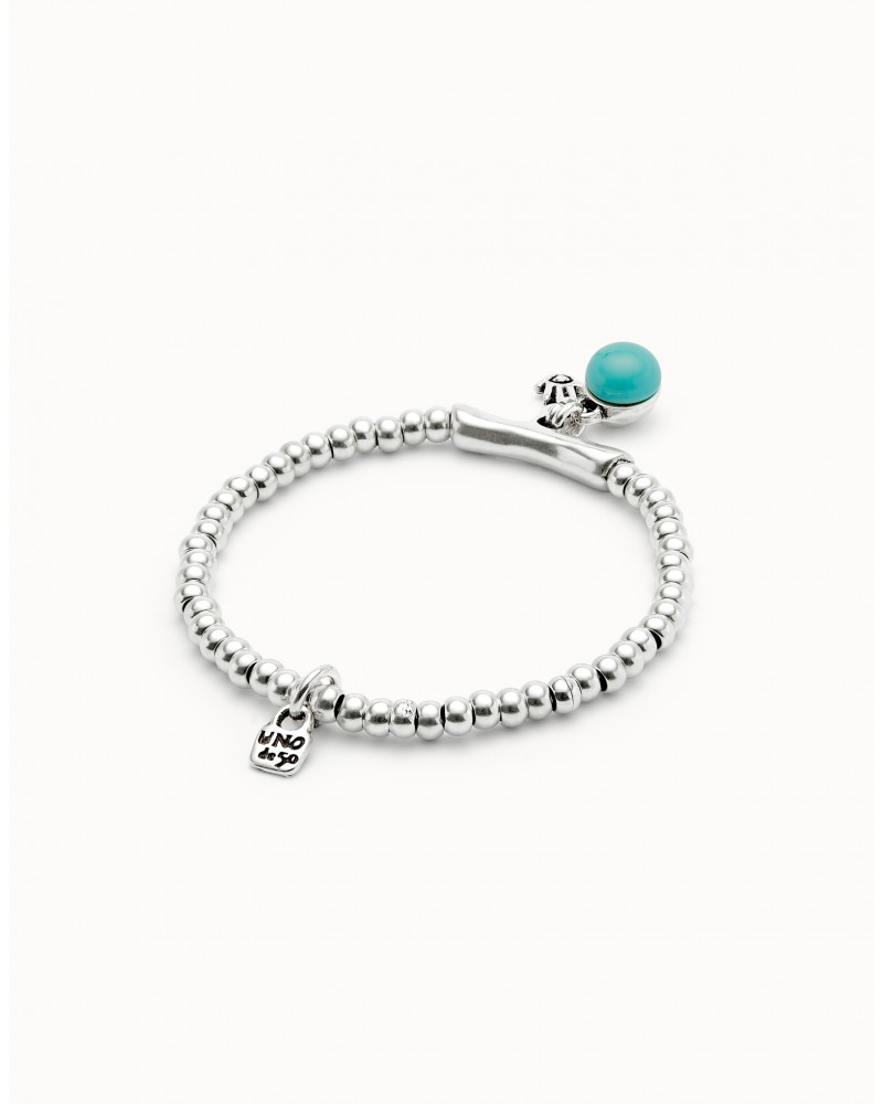 PULSERA PLATEADA CON BOLA DE TURQUESA DE UNOde50