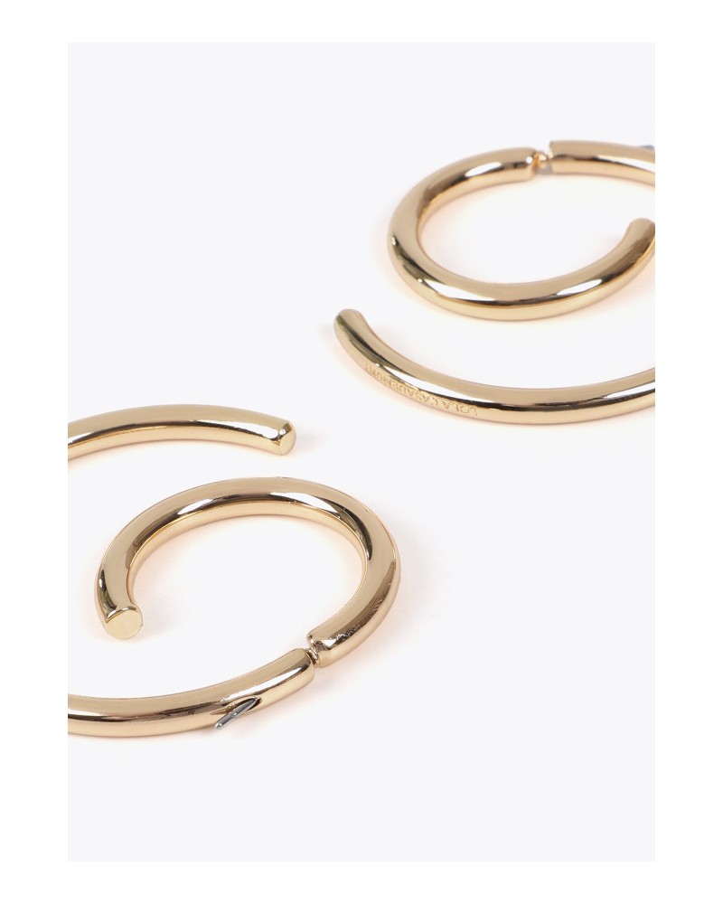 Pendientes espiral dorados de Lola Casademunt