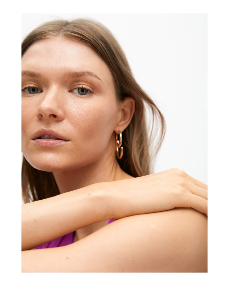 Pendientes espiral dorados de Lola Casademunt