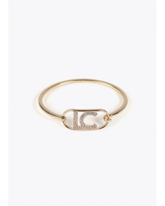 Pulsera rìgida con logo dorada de Lola Casademunt