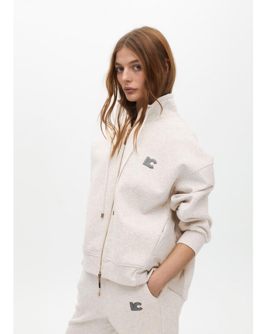 Sudadera beige detalle lateral de Lola Casademunt