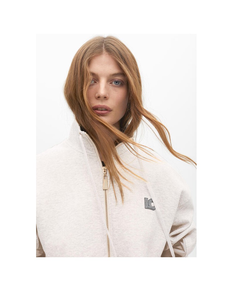 Sudadera beige detalle lateral de Lola Casademunt