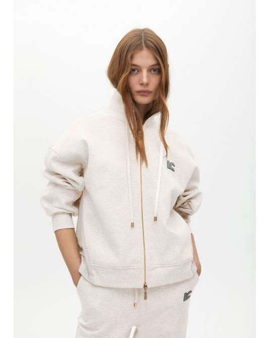 Sudadera beige detalle lateral de Lola Casademunt