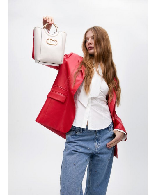 Bolso crudo con asa metàlicas de Lola Casademunt