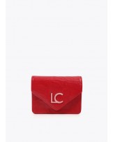 Monedero y llavero rojo y rosa de Lola Casademunt