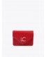 Monedero y llavero rojo y rosa de Lola Casademunt