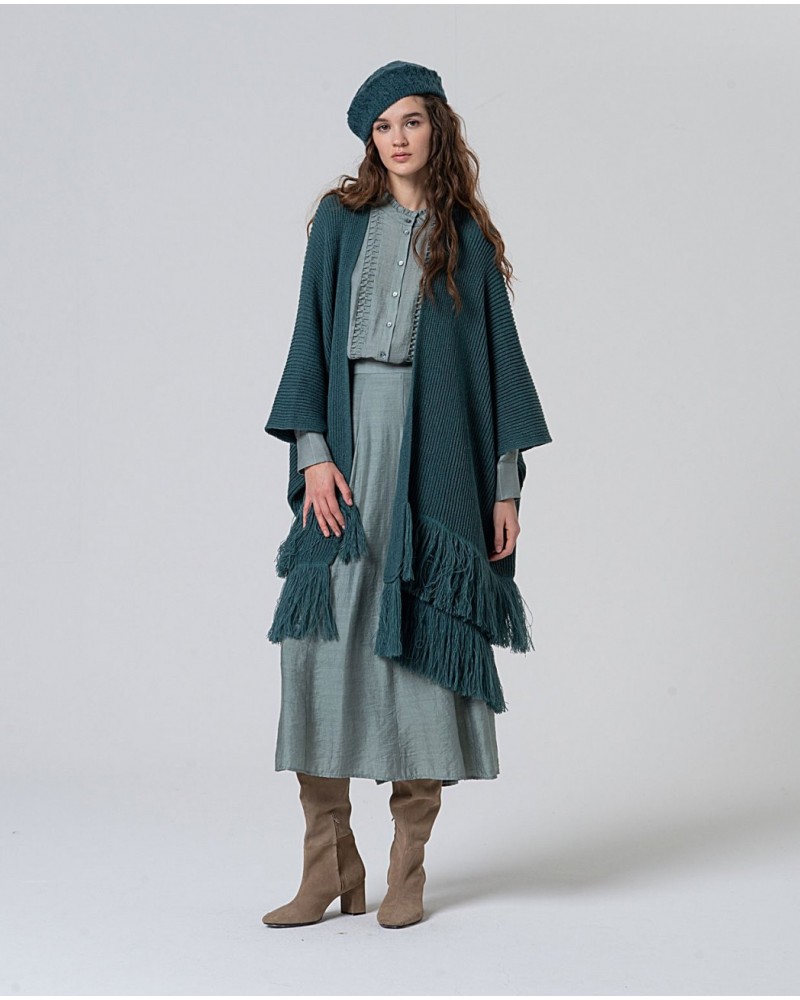 Poncho de punto AZUL de Surkana