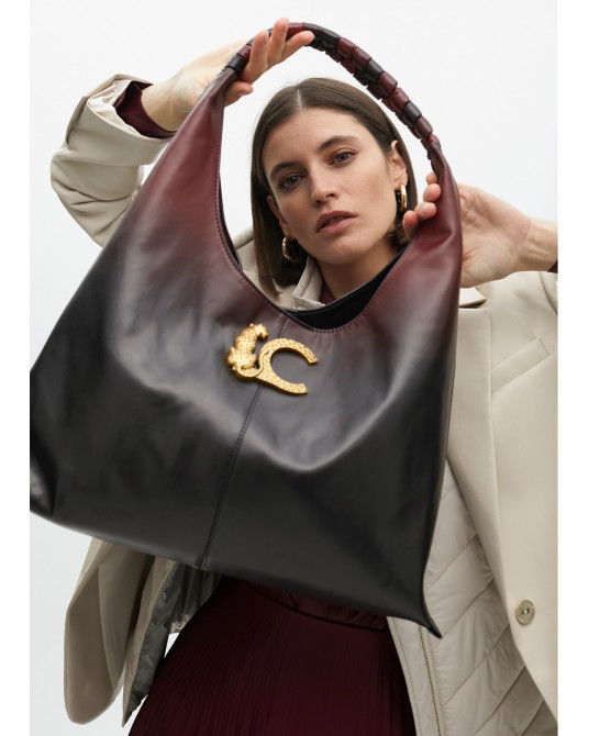 Bolso efecto piel asa trenzada y logo de Lola Casademunt