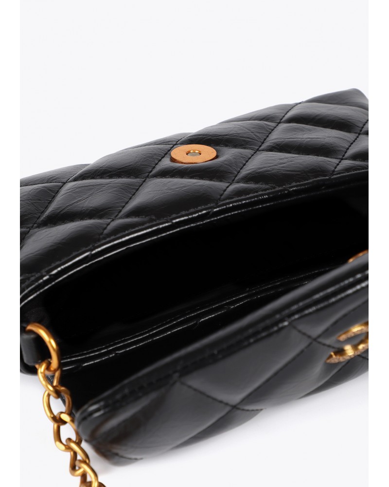 Mini bolsito acolchado negro de Lola Casademunt