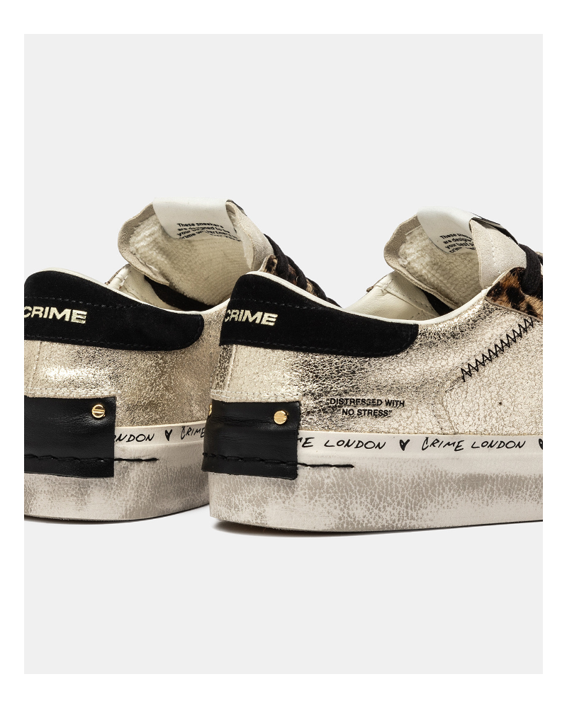Zapatillas metalizada animal print de Crime London