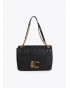 Bolso negro logotipo pespunte Lola Casademunt