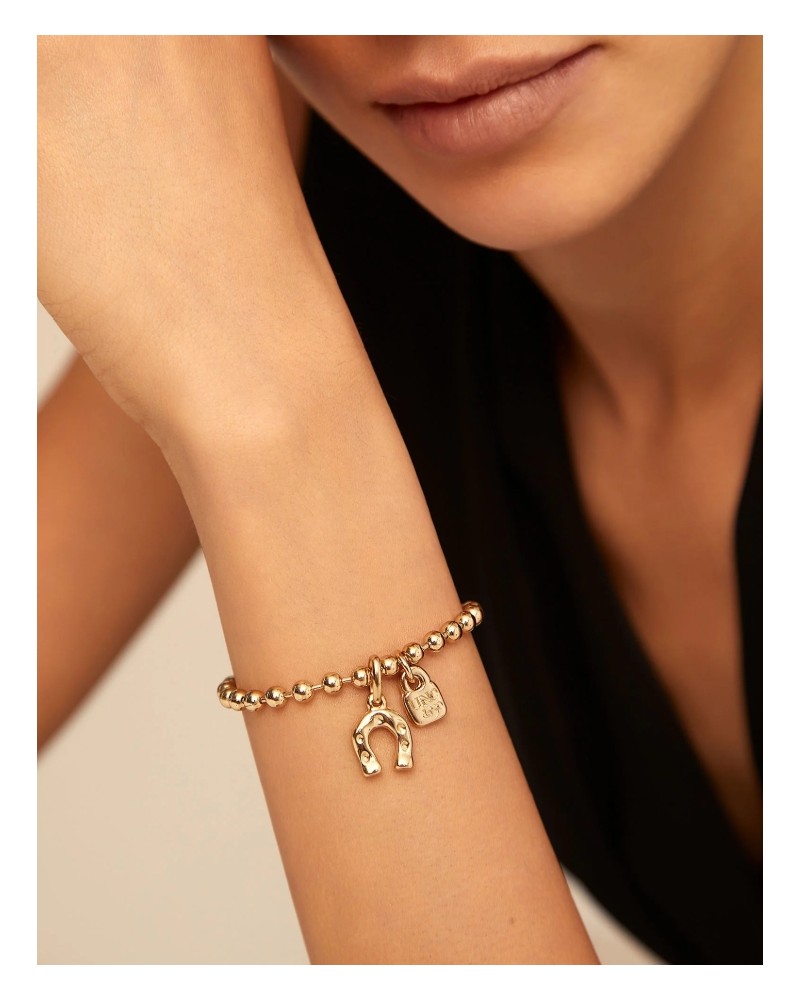 Pulsera bolitas baño oro UNOde50