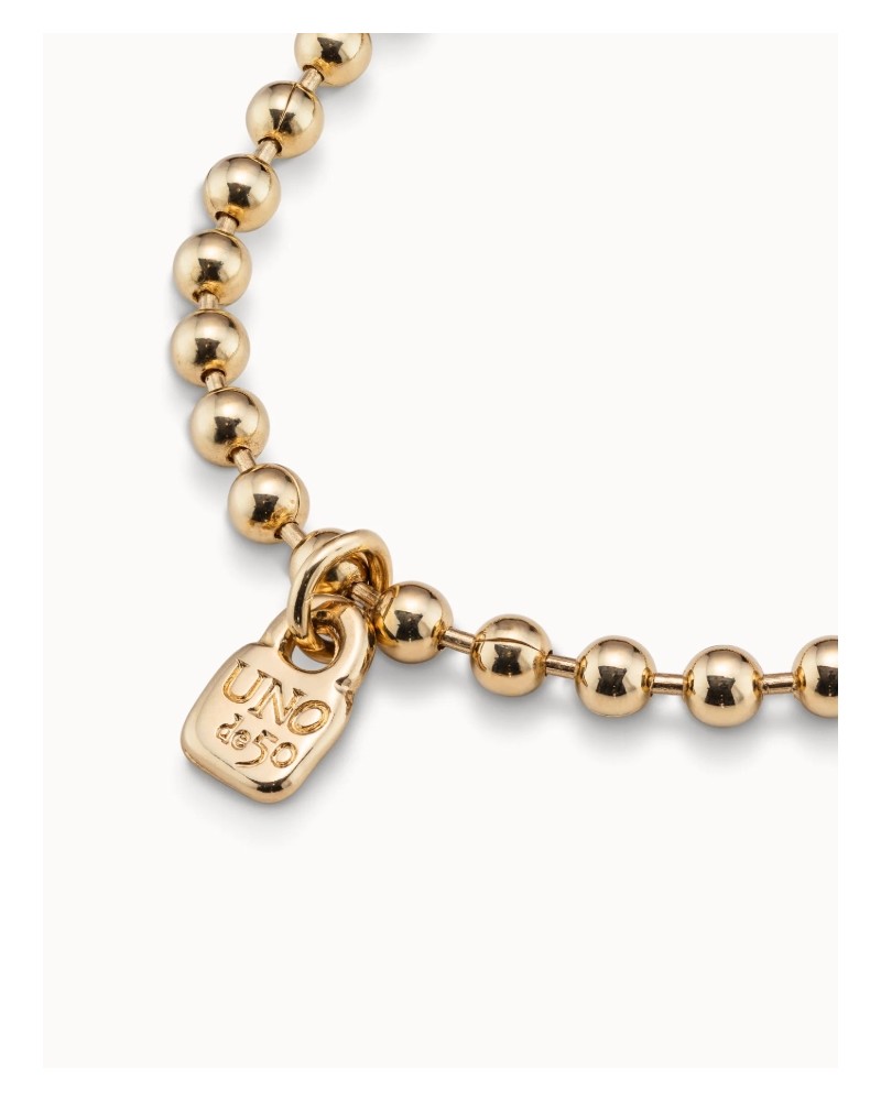 Pulsera bolitas baño oro UNOde50