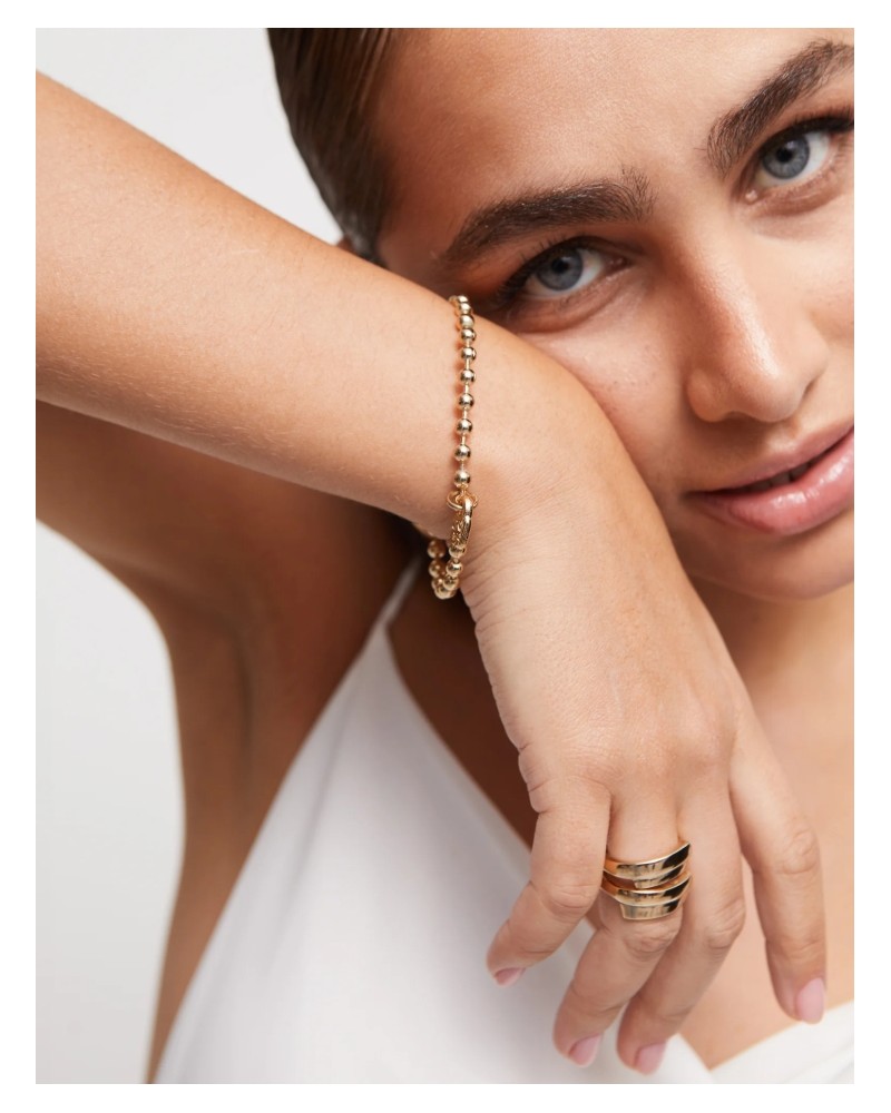 Pulsera bolitas baño oro UNOde50