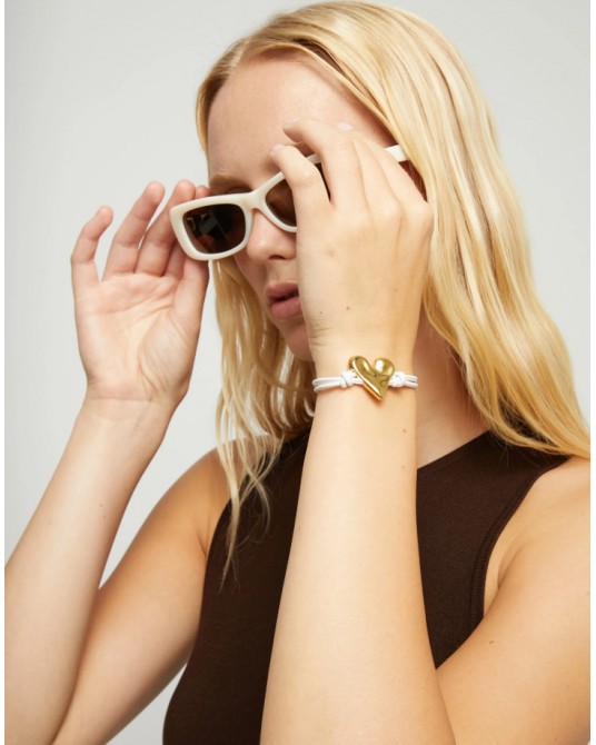 Pulsera de cuero con corazòn baño oro UNOde50