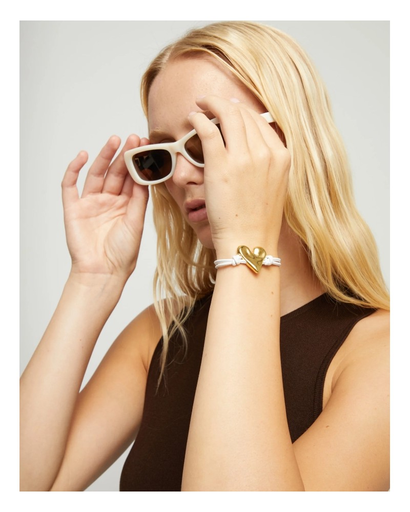 Pulsera de cuero con corazòn baño oro UNOde50