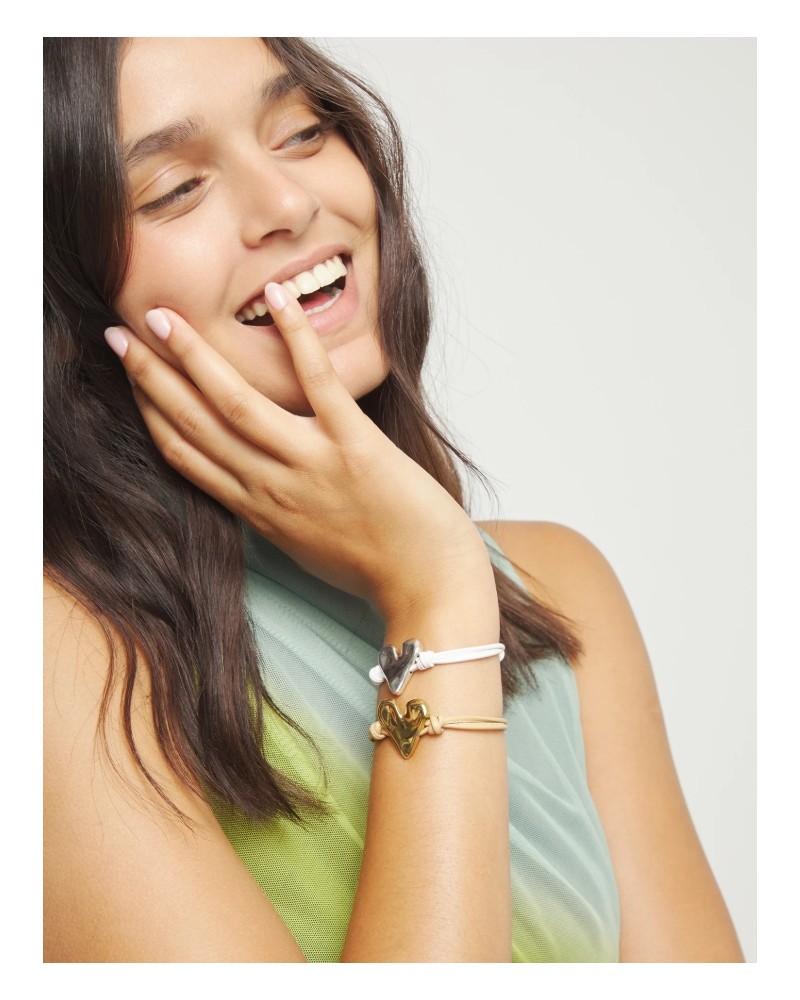 Pulsera de cuero con corazòn baño plata UNOde50