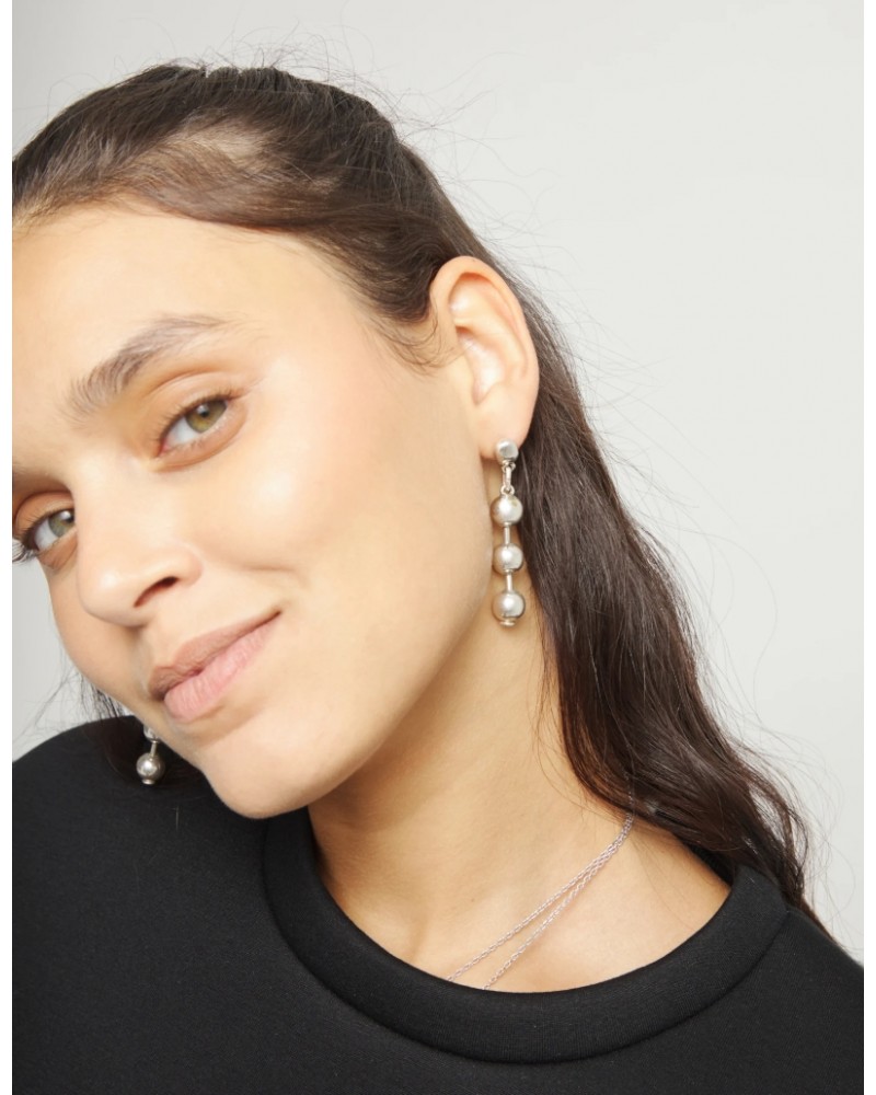 Pendientes bolas bañados en plata de ley UNOde50