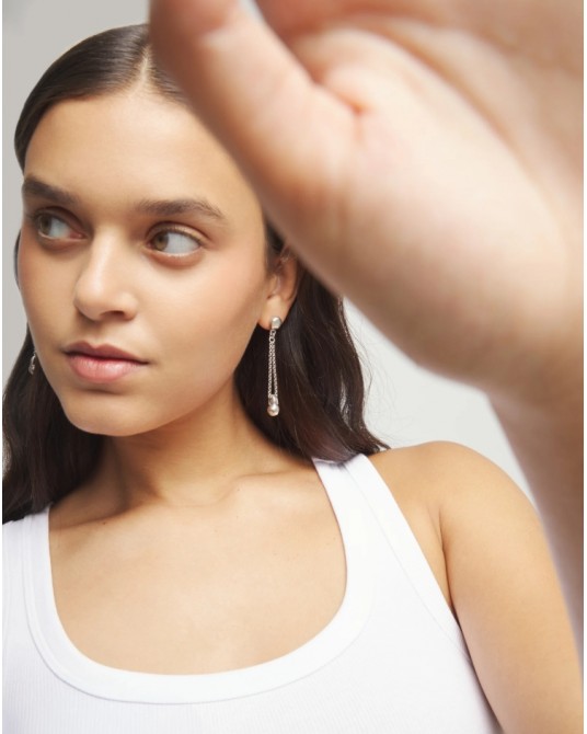 Pendientes largos bañados en plata UNOde50