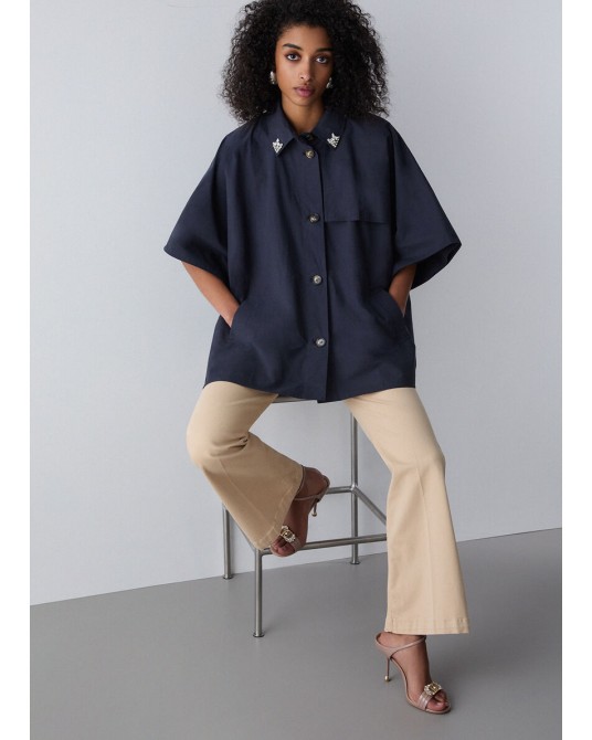 Poncho gabardina con bordados joya Liujo